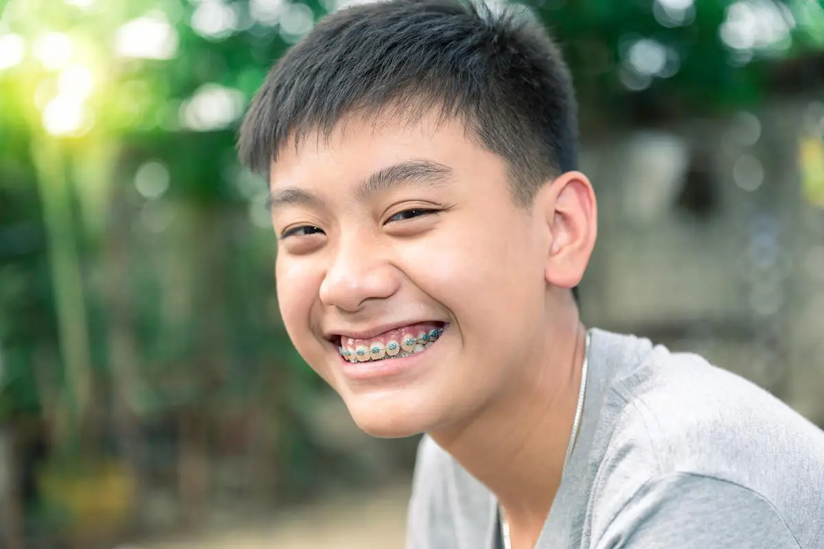 Dentist_Scottsdale_AZ_guy_With_Braces_Smiling Dentist_Scottsdale_AZ_guy_With_Braces_Smiling